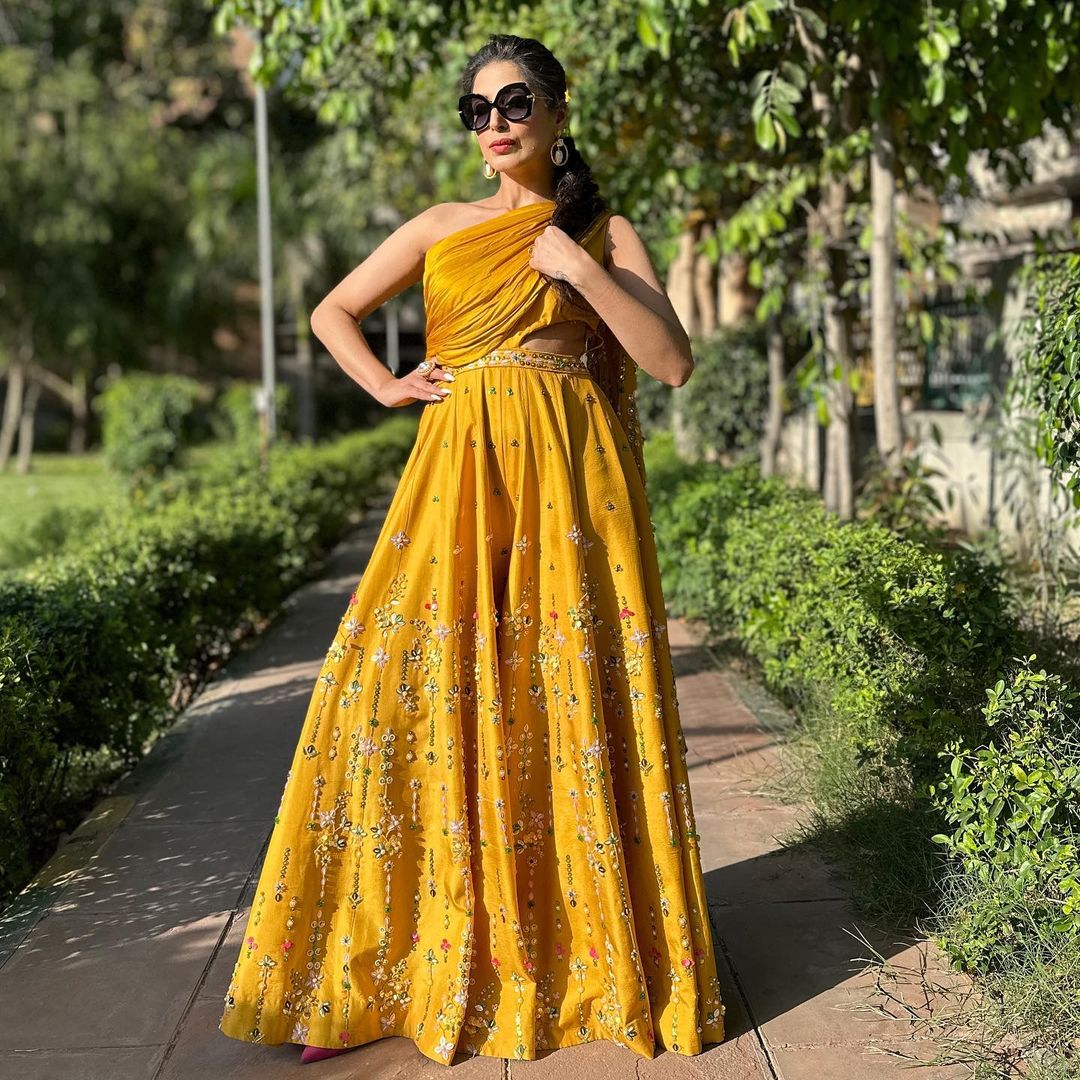 YELLOW COLOR KURTI WITH EMBROIDERY ON BOTTOM