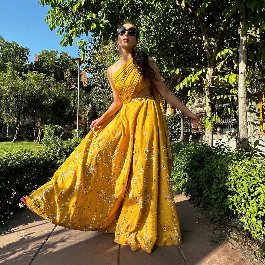 YELLOW COLOR KURTI WITH EMBROIDERY ON BOTTOM