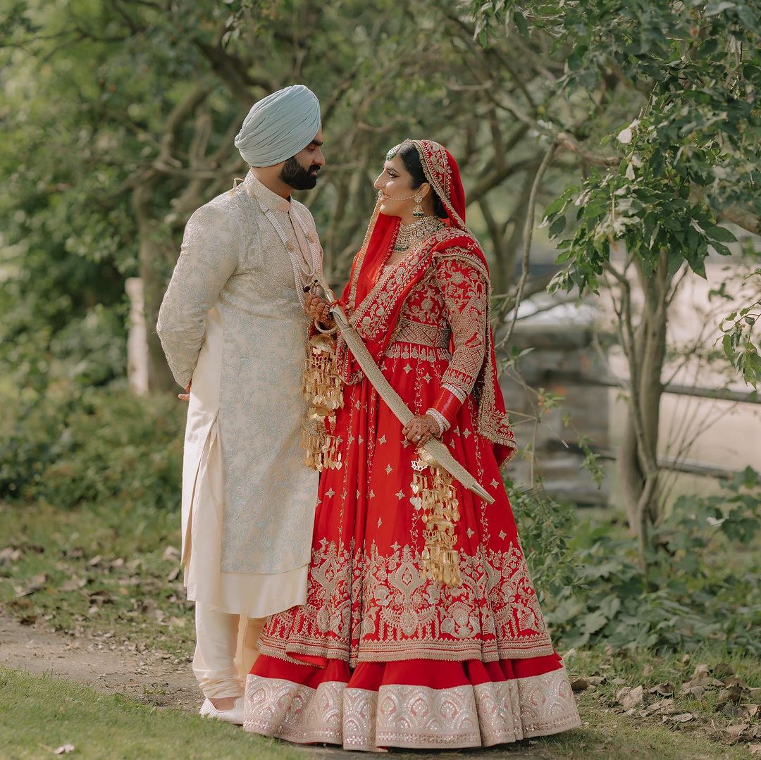 BRIDAL VENETIAN RED DESIGNED LEHENGA WITH HEAVY EMBROIDERY