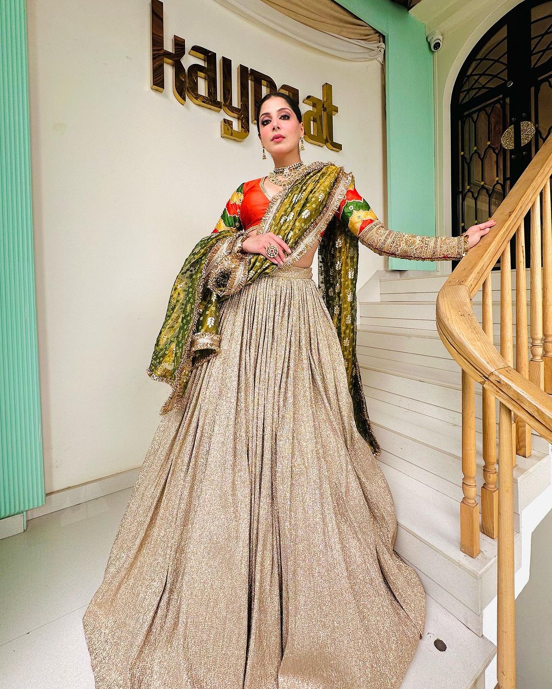 EMBROIDERED RUST BLOUSE WITH SHIMMER LEHENGA