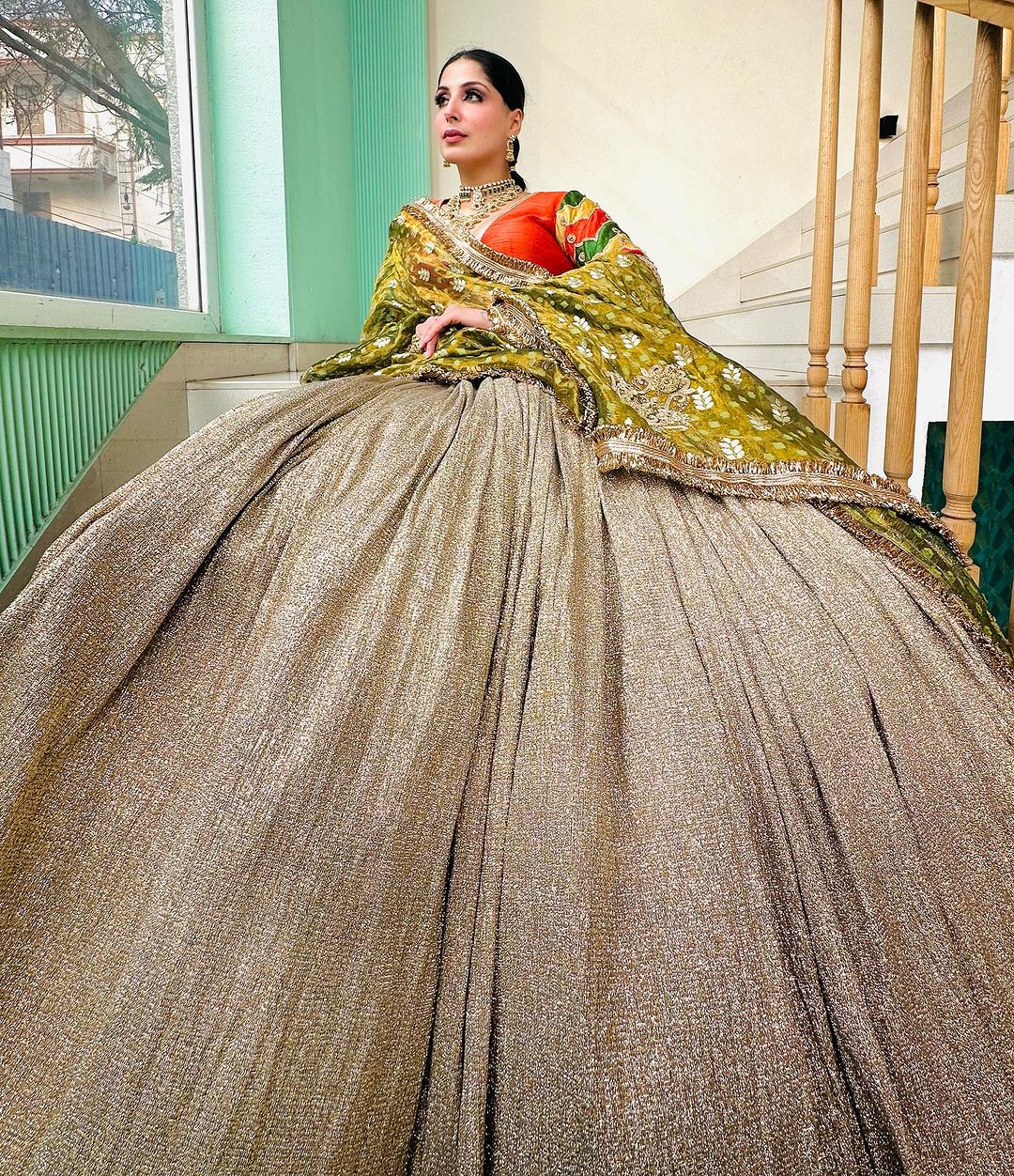 EMBROIDERED RUST BLOUSE WITH SHIMMER LEHENGA