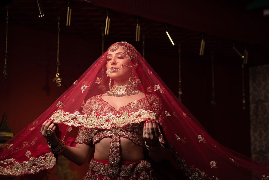 BRIDAL RED PEACOCK DESIGNED LEHENGA