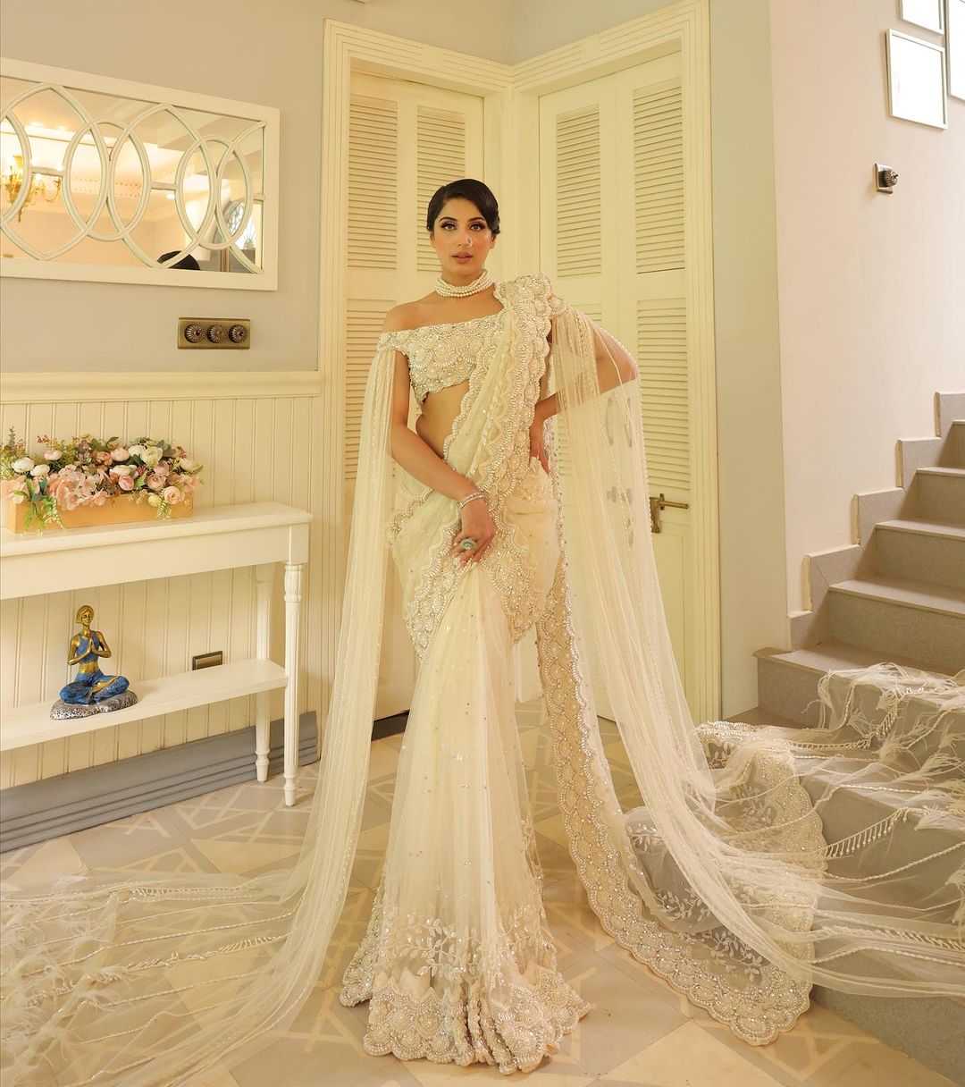 CREAM WHITE COLOR SAREE WITH FAIRY DESIGN & LONG TRAIL