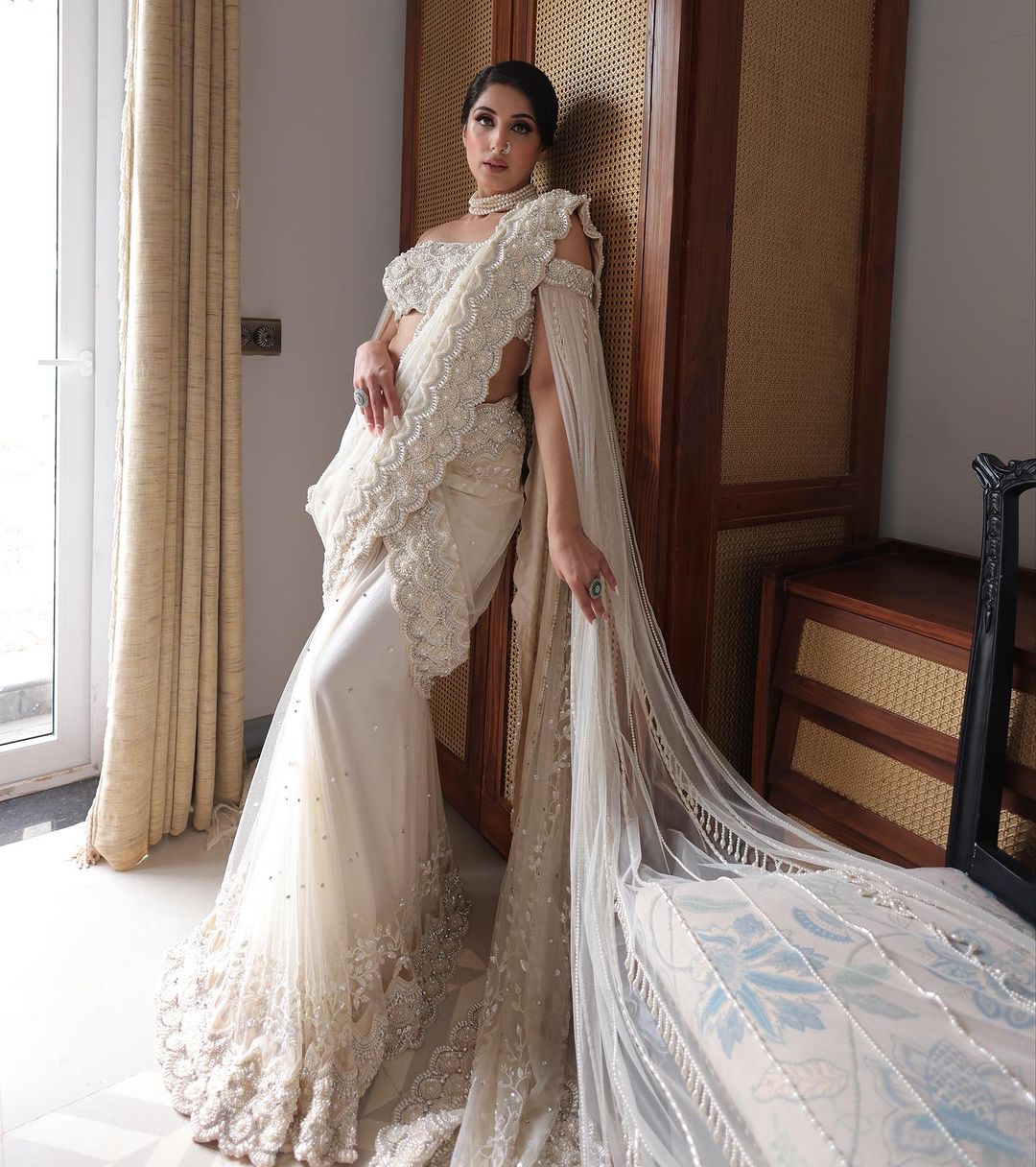 CREAM WHITE COLOR SAREE WITH FAIRY DESIGN & LONG TRAIL