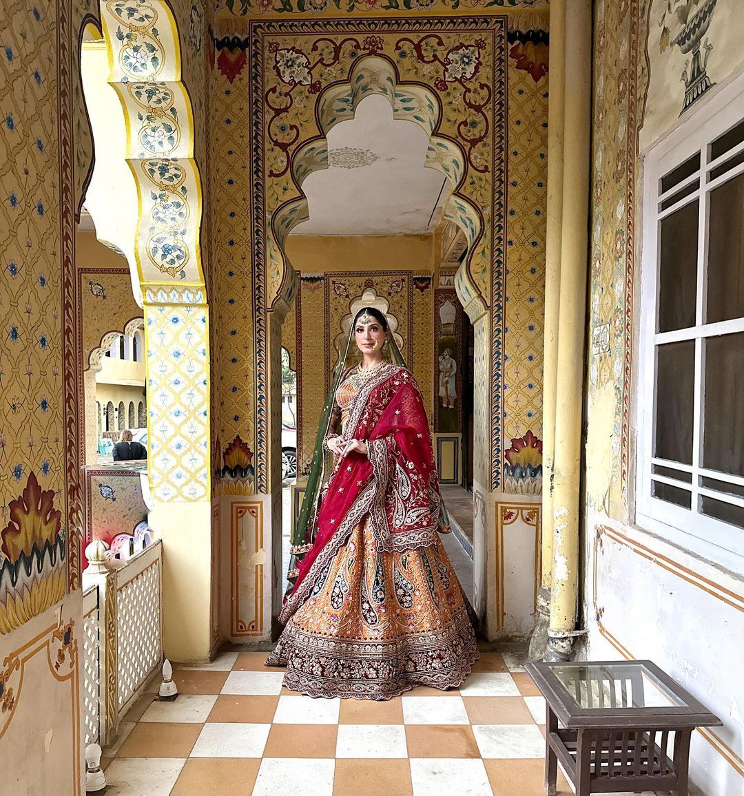 ORANGE PEEL DESIGNED LEHENGA WITH HEAVY EMBROIDERY & RUST DUPATTA
