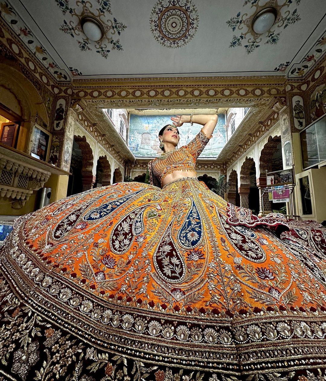 ORANGE PEEL DESIGNED LEHENGA WITH HEAVY EMBROIDERY & RUST DUPATTA