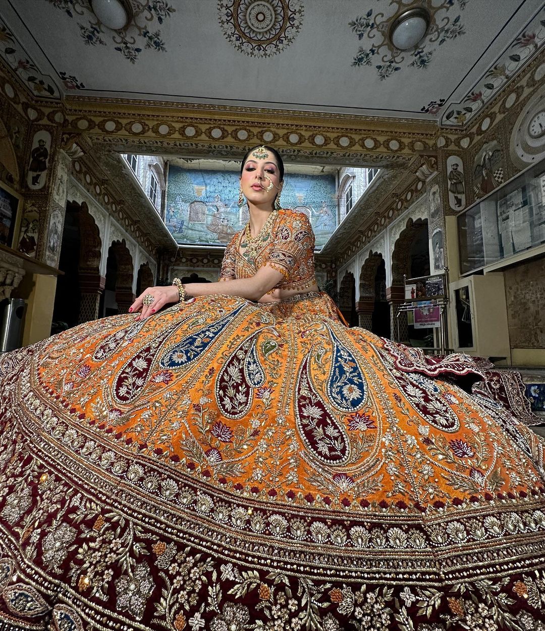 ORANGE PEEL DESIGNED LEHENGA WITH HEAVY EMBROIDERY & RUST DUPATTA