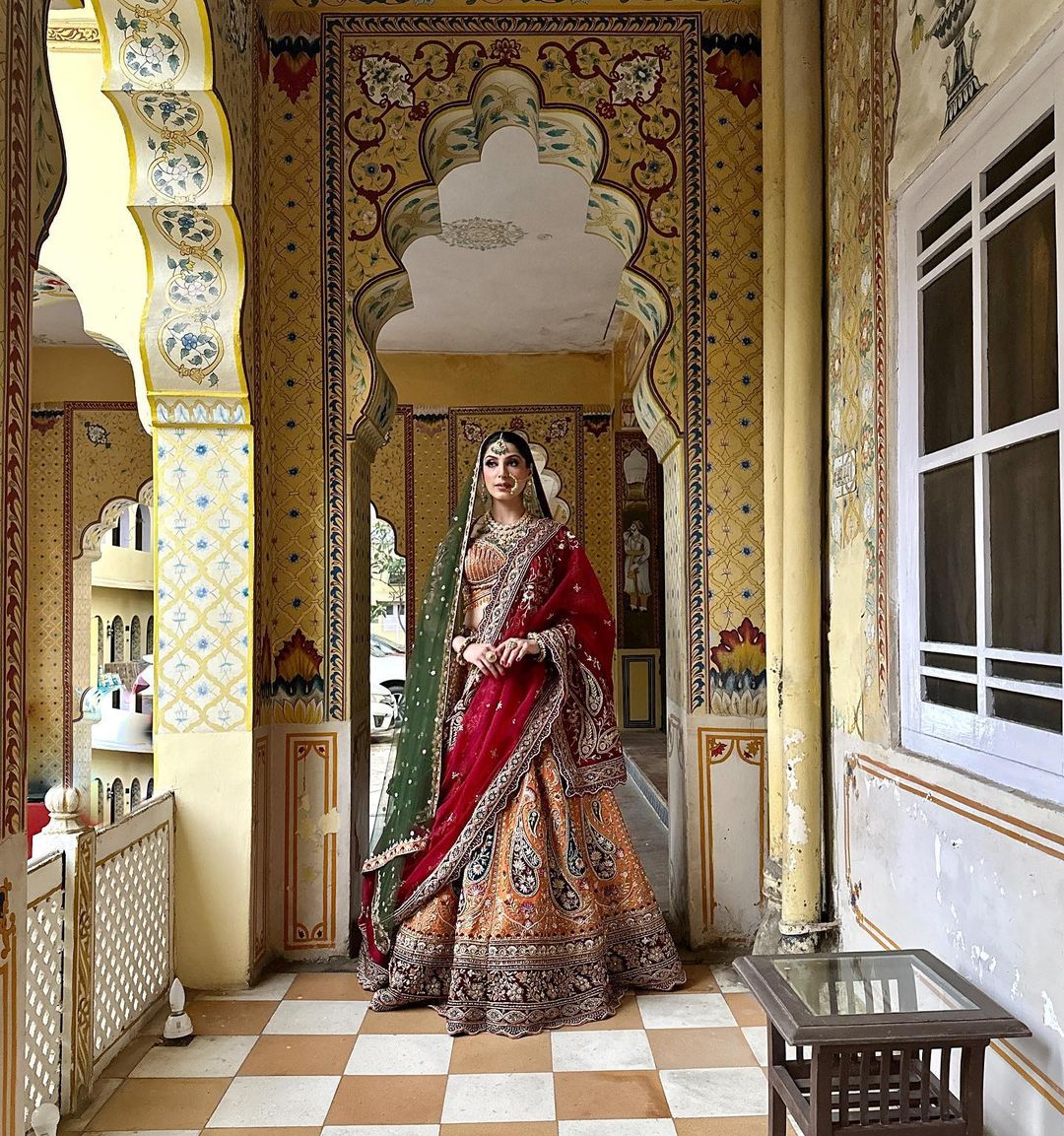ORANGE PEEL DESIGNED LEHENGA WITH HEAVY EMBROIDERY & RUST DUPATTA