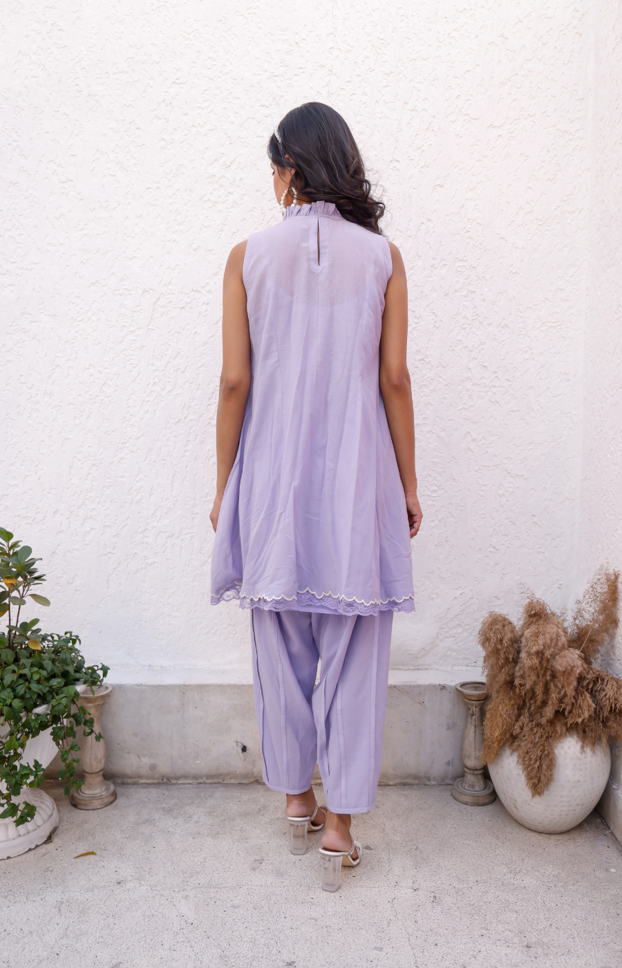 PURPLE COLOR KURTI WITH EMBROIDERY ON TOP