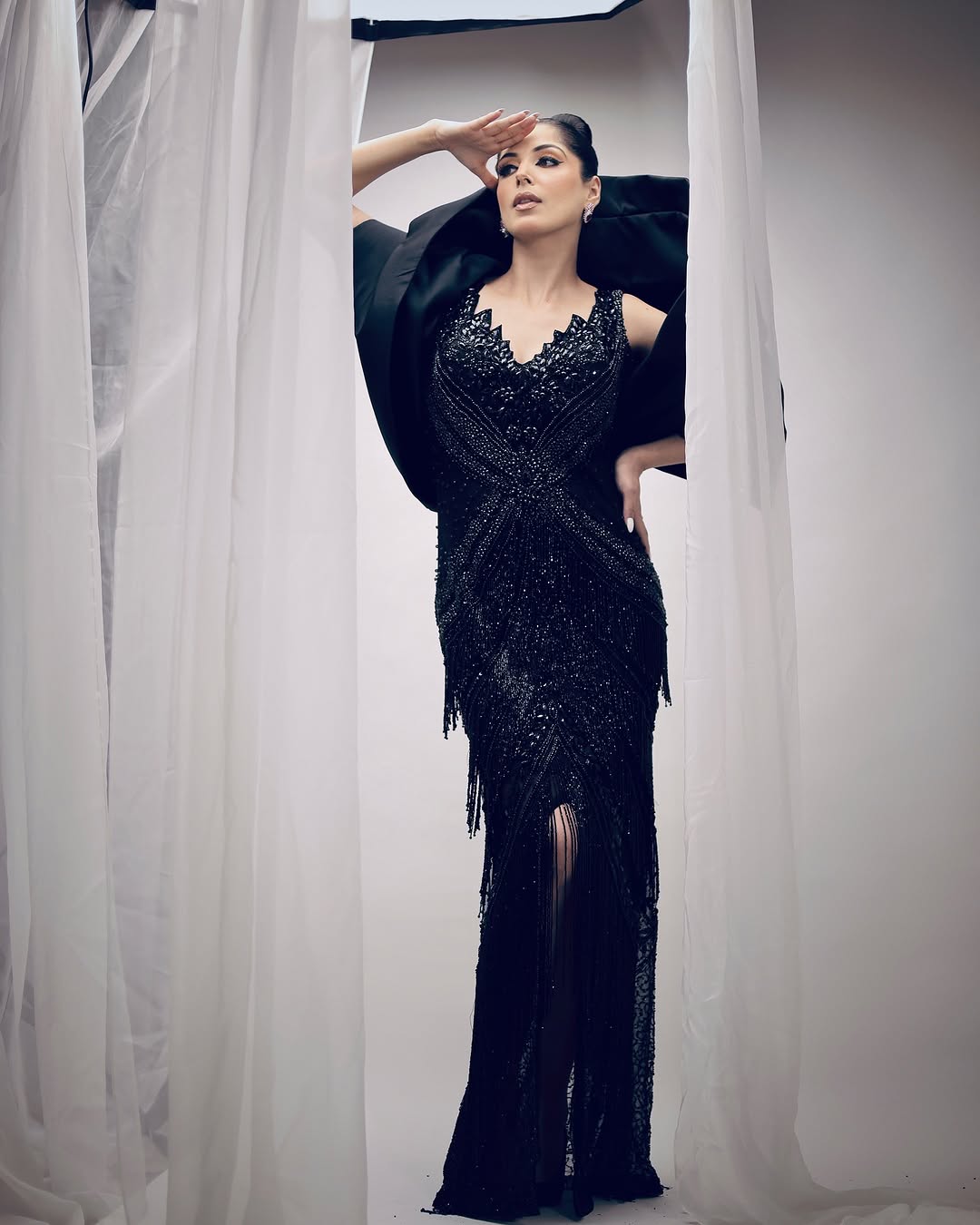 ELEGANT COAL BLACK FISHCUT GOWN