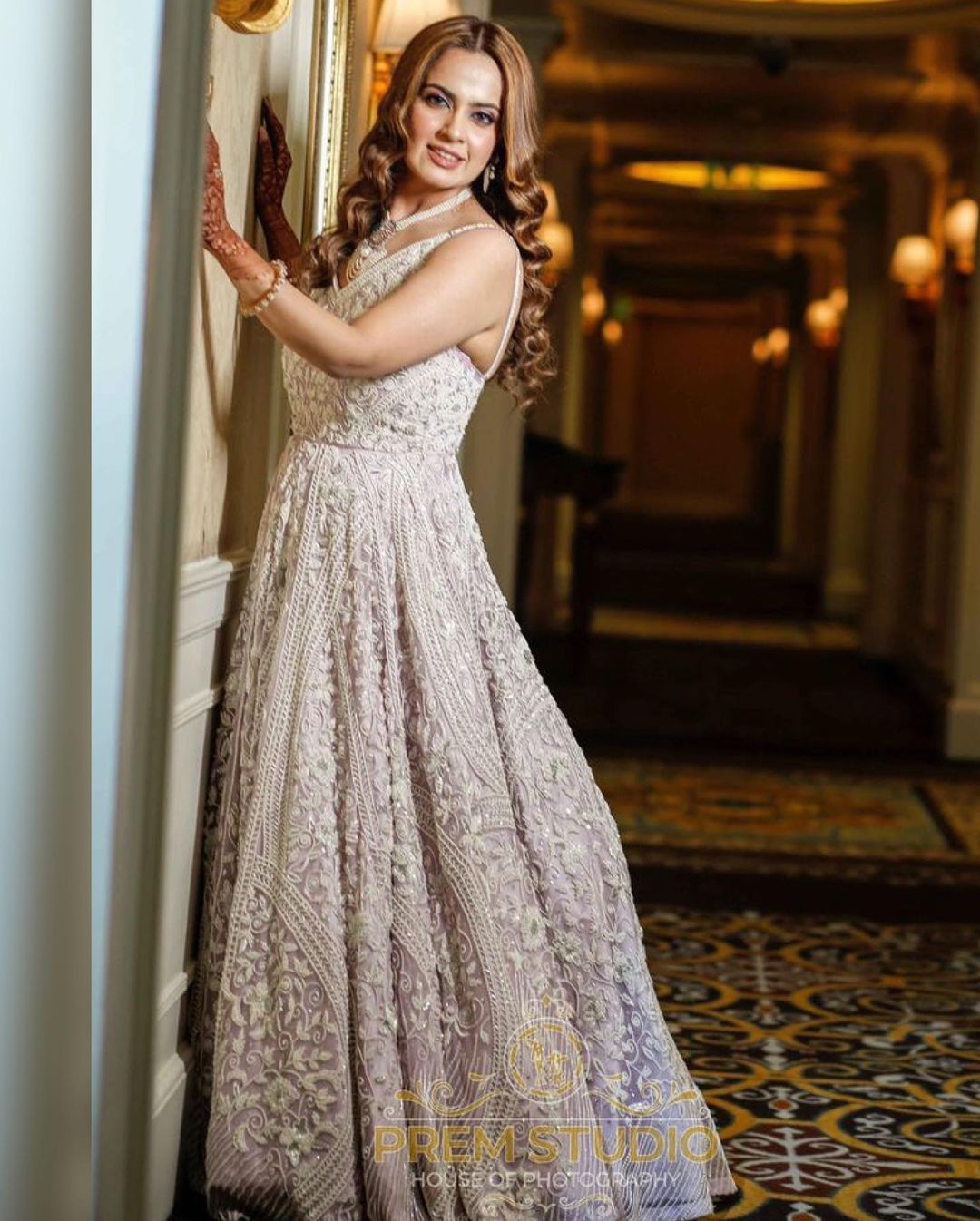 THIRSTLE COLOR GOWN WITH V PEARL WORK