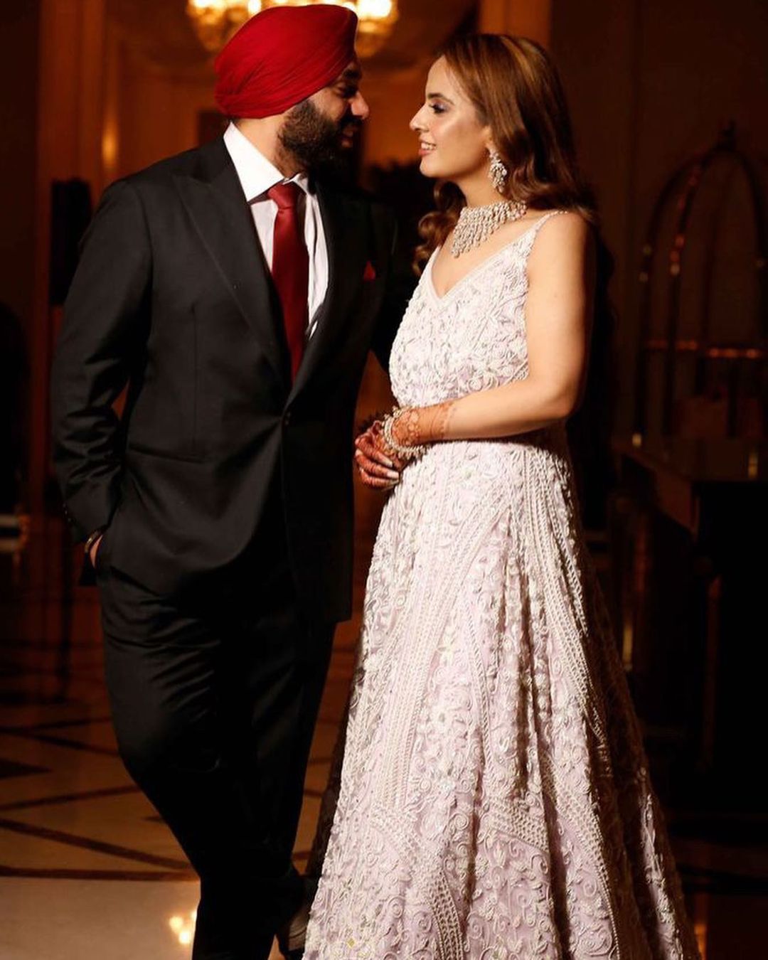THIRSTLE COLOR GOWN WITH V PEARL WORK
