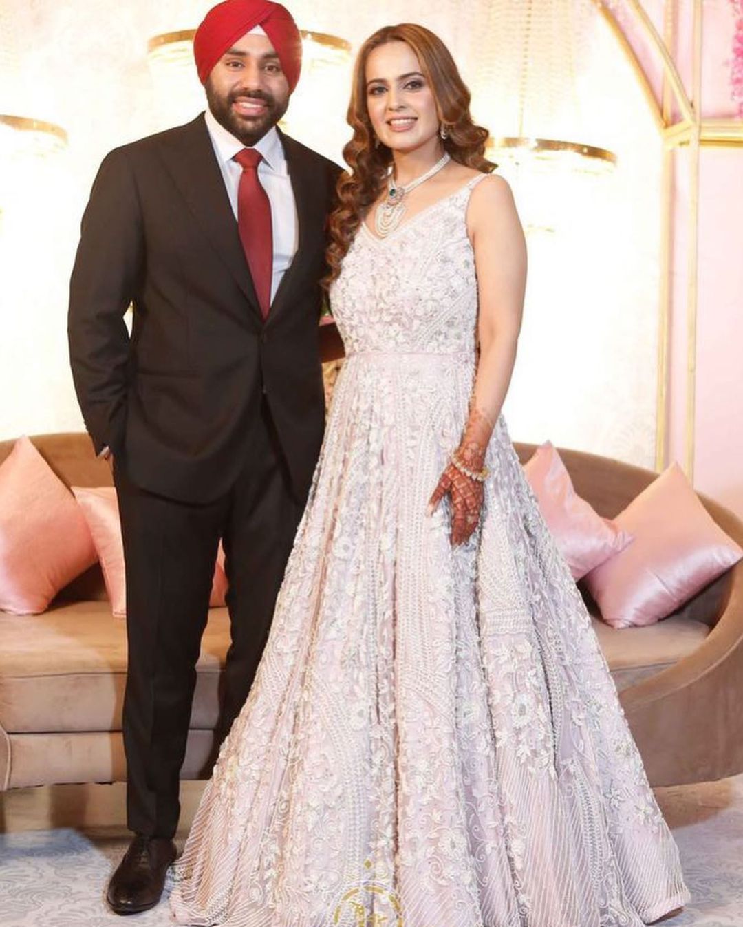 THIRSTLE COLOR GOWN WITH V PEARL WORK