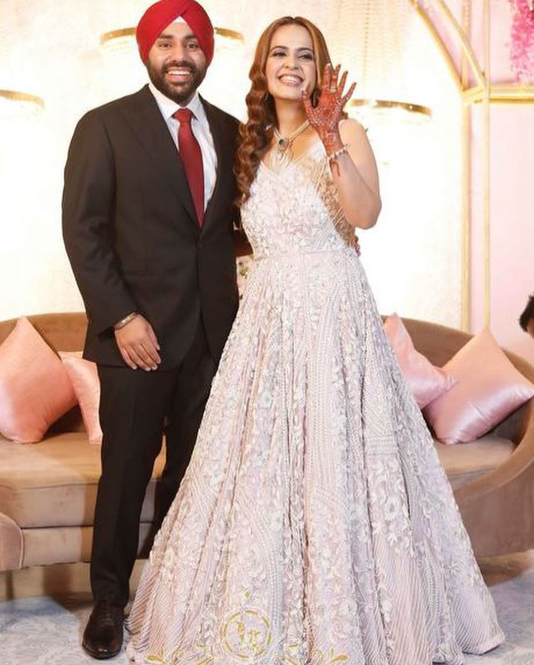 THIRSTLE COLOR GOWN WITH V PEARL WORK