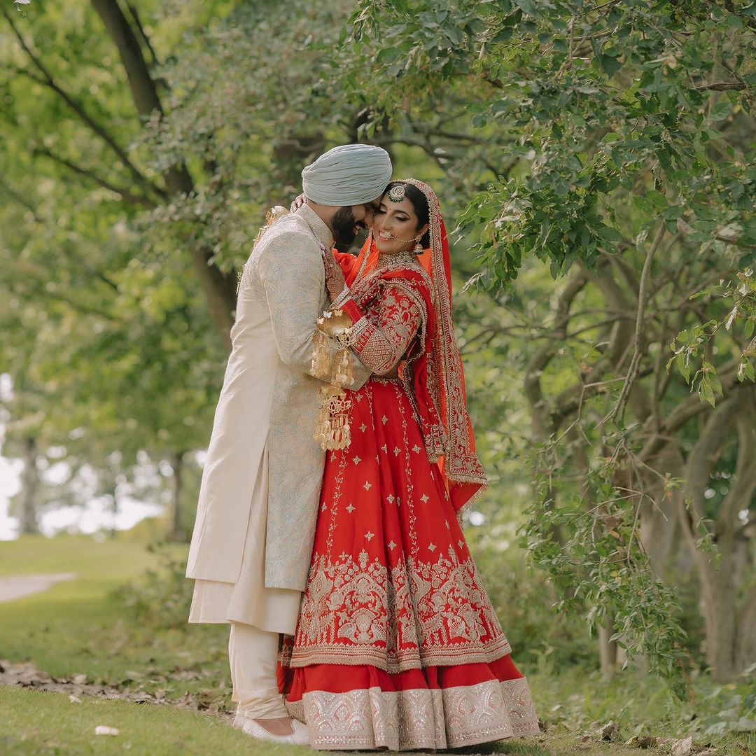 BRIDAL VENETIAN RED DESIGNED LEHENGA WITH HEAVY EMBROIDERY