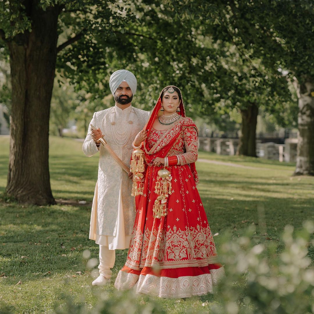 BRIDAL VENETIAN RED DESIGNED LEHENGA WITH HEAVY EMBROIDERY